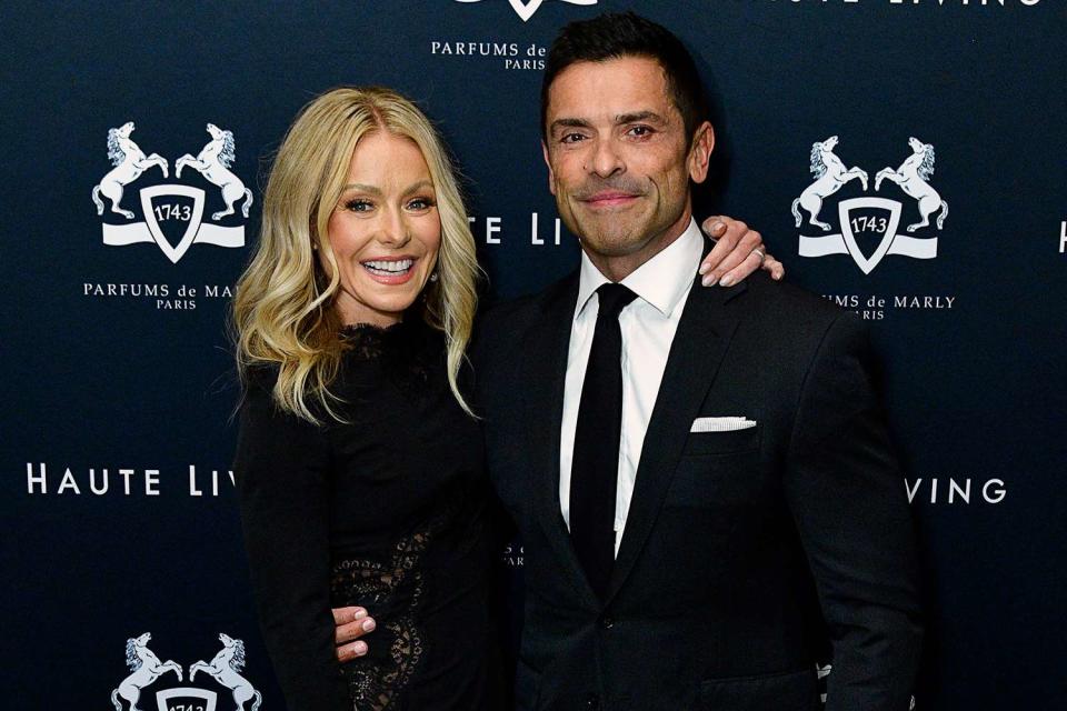 <p>Eugene Gologursky/Getty</p> Kelly Ripa and Mark Consuelos pose for a photo on September 27, 2022 in New York City