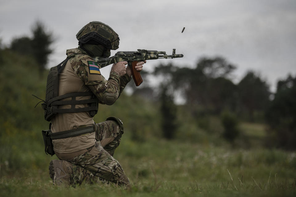 A volunteer soldier attends a training outside Kyiv, Ukraine, Saturday, Aug. 27, 2022. Some volunteers signed up to join a Chechen unit that fights alongside the Ukrainian military. Fighters from Chechnya, the Russian republic in the North Caucasus, are participating on both sides of the conflict in Ukraine, with pro-Kyiv volunteers loyal to Dzhokhar Dudayev, the late Chechen leader who headed the republic's drive for independence from Russia. (AP Photo/Andrew Kravchenko)