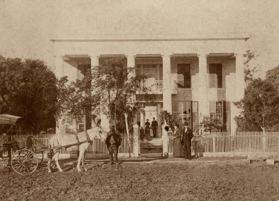 A portrait circa 1893 shows the Cochran family with an unnamed coachman. The house is now a museum in the West Campus neighborhood.