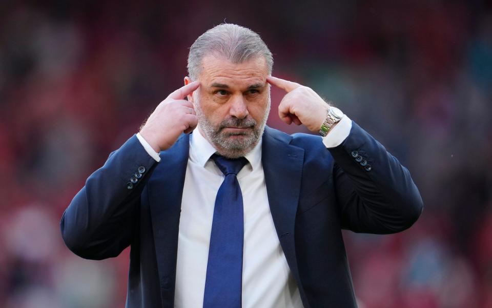 Tottenham's head coach Ange Postecoglou gestures as he leaves the pitch at the end of the English Premier League football match between Liverpool and Tottenham Hotspur at Anfield Stadium in Liverpool, England, Sunday, May 5, 2024