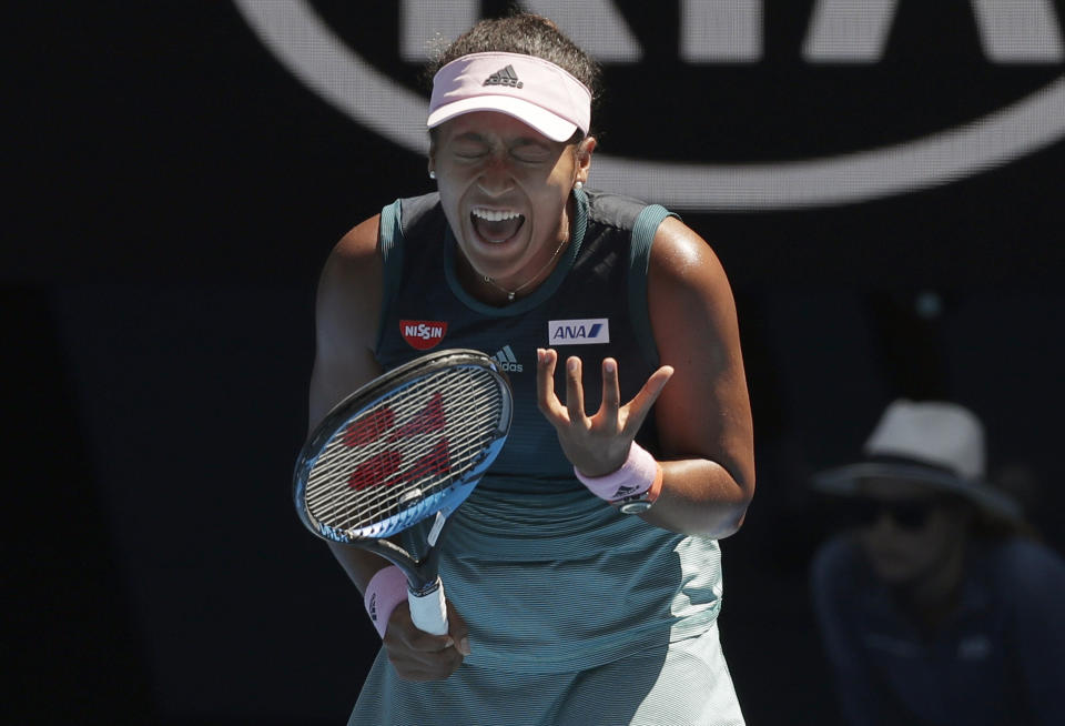 Japan's Naomi Osaka reacts after losing a point to Ukraine's Elina Svitolina during their quarterfinal match at the Australian Open tennis championships in Melbourne, Australia, Wednesday, Jan. 23, 2019. (AP Photo/Kin Cheung)