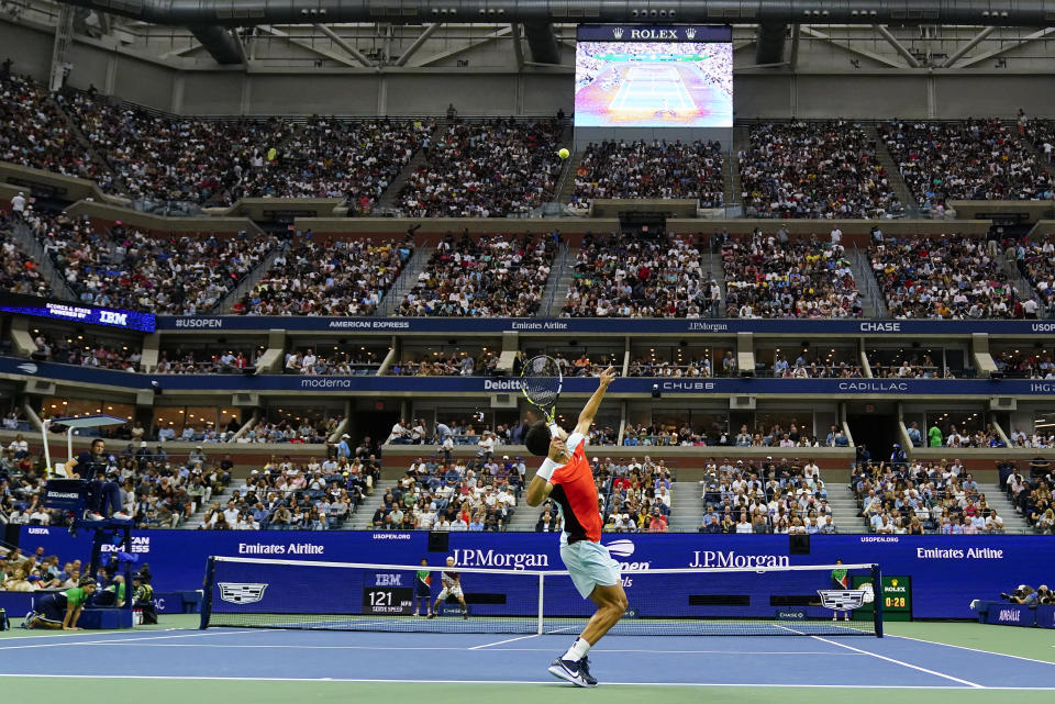 Carlos Alcaraz, of Spain, serves to Casper Ruud, of Norway, during the men's singles final of the U.S. Open tennis championships, Sunday, Sept. 11, 2022, in New York. (AP Photo/Matt Rourke)