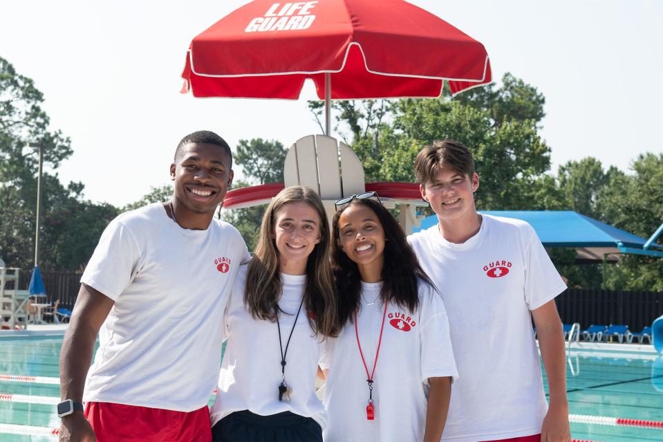 Lifeguards from Maxwell Air Force Base responded to a car crash outside of the pool, June 17, 2023. Landon Townsend, Jasmine Rudolph, Davis Bell, and Brianna Cooley were the lifeguards standing under the pool awning when they heard a loud crash and ran out to assist. After noticing the crash could have resulted in a possible injury, two of the lifeguards pried one of the vehicle's doors open.