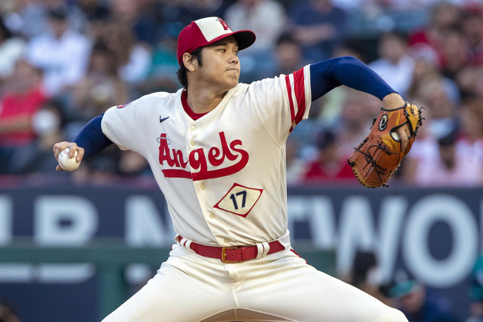 Los Angeles Angels starting pitcher Shohei Ohtani throws to a Seattle Mariners batter during the first inning of a baseball game in Anaheim, Calif., Saturday, Sept. 17, 2022. (AP Photo/Alex Gallardo)