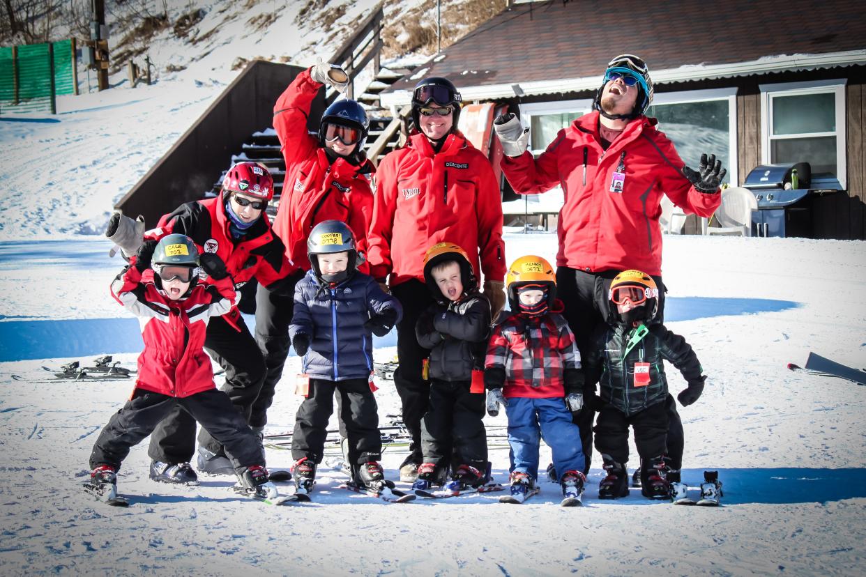 Ski instructors and their young students goof around at Tyrol Basin in Mount Horeb.