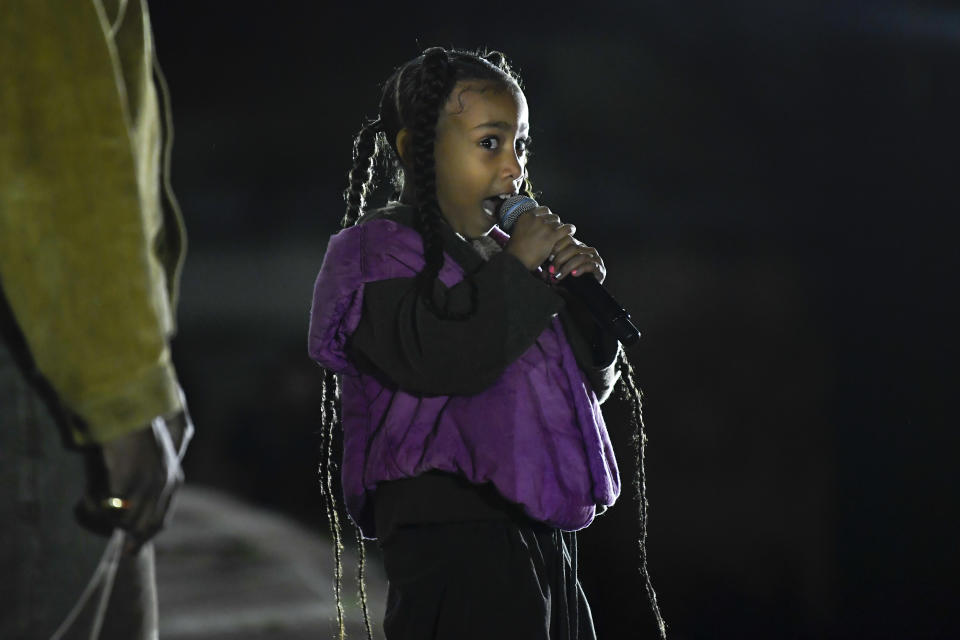 Kanye West and North West on the catwalk (Photo by WWD/Penske Media via Getty Images)