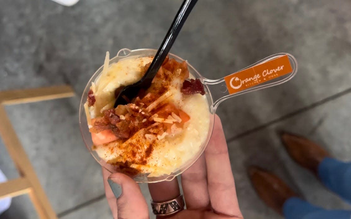 Orange Clover Kitchen & More, located in Jeffersonville, Indiana, served miniature dishes of hot brown grits at the 35th annual Taste of Derby Festival, held Tuesday at Louisville Slugger Field.