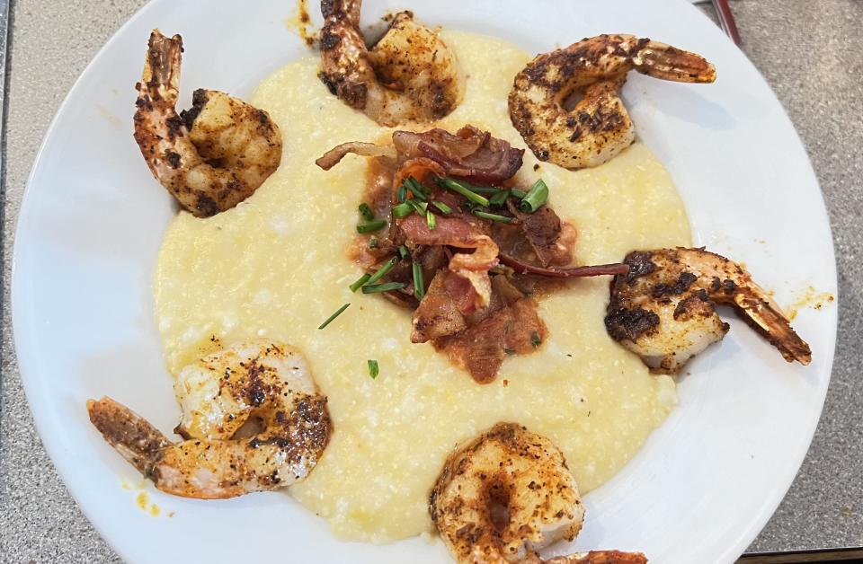 At Captain's Galley Restaurant in Fort Pierce, the grits were hot, cheesy and rimmed with tender, blackened shrimp then topped with a piquant sauce of onions, tomatoes and jalapenos.