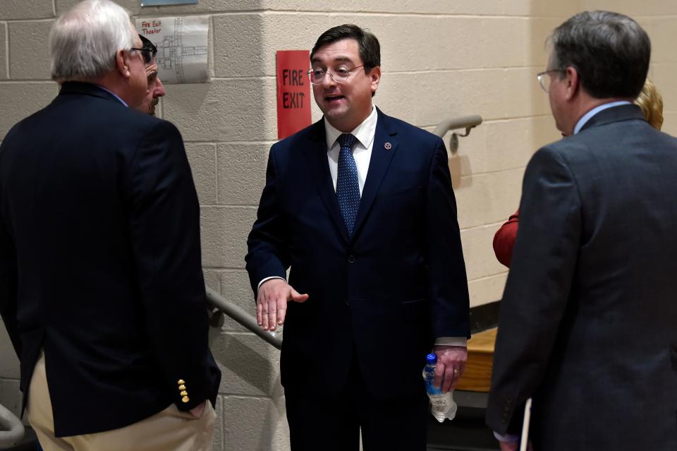 Tennessee Attorney General Jonathan Skrmetti talks with a group of people after speaking about the impact of social media has on children and families during a town hall meeting on Thursday, March 2, 2023, in Clarksville, Tenn. 