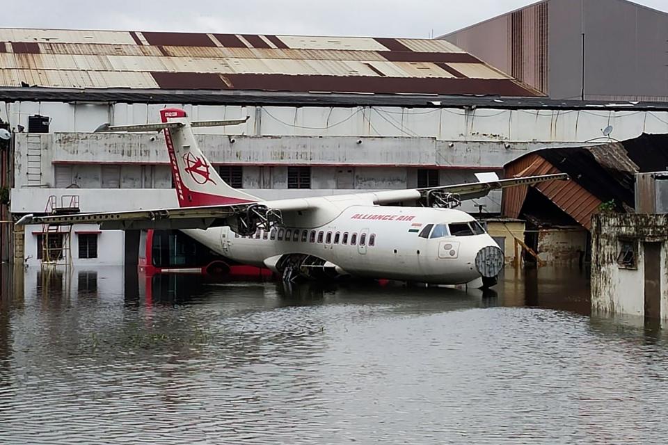 Image: An aircraft is parked at the flooded Netaji Subhas Chandra Bose International Airport after the landfall of cyclone Amphan in Kolkata (AFP - Getty Image)