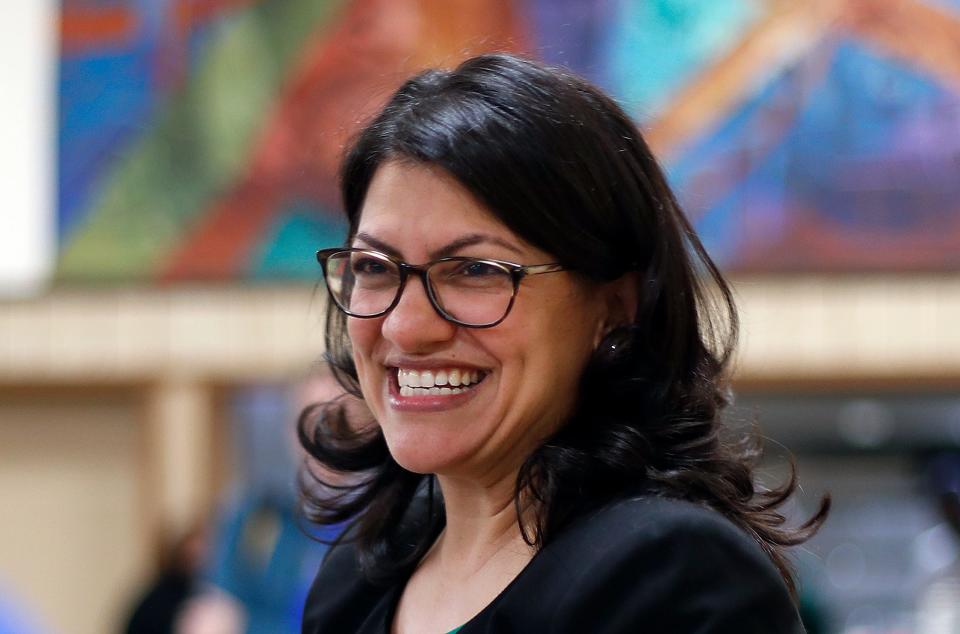 FILE - In this Oct. 26, 2018 file photo, Rashida Tlaib, Democratic candidate for the Michigan's 13th Congressional District, smiles during a rally in Dearborn, Mich. (AP Photo/Paul Sancya, File) ORG XMIT: CER971