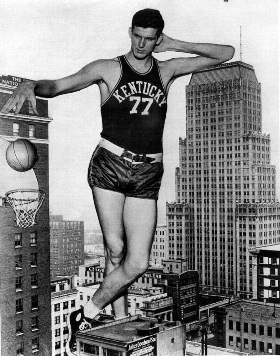 Bill Spivey was the first 7-footer in Kentucky basketball history. He led the Wildcats to the 1951 NCAA title. Spivey is pictured against the Memphis skyline in this vintage photo illustration.