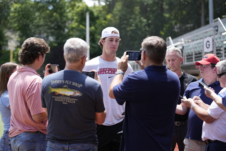 Georgia's Charlie Condon speaks to the media before an NCAA college baseball practice, Wednesday, May 15, 2024, in Athens, Ala. (AP Photo/Brynn Anderson)