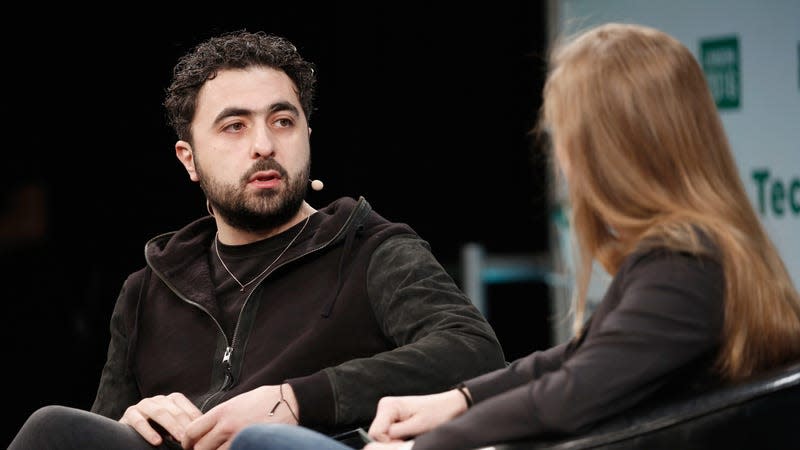 Co-founder of Google DeepMind Mustafa Suleyman attends a Q&A with Special Projects Editor forTechCrunch, Jordan Crook during day 1 of TechCrunch Disrupt London at the Copper Box on December 5, 2016.