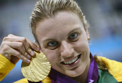 Australia's Jacqueline Freney holds the gold medal after winning the Women's 50 metres Freestyle Final S7 category during the London 2012 Paralympic Games at the Aquatics Centre in the Olympic Park in east London