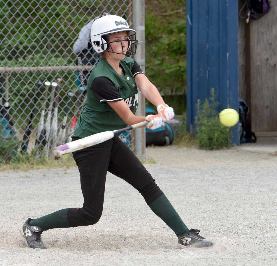 Charleigh Hicks of D-Y launches a Sandwich pitch into the outfield.