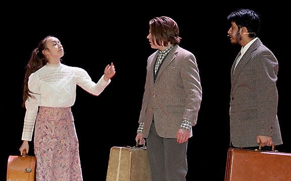 Sturgis High School students Ana Merchant (Anya), Aidan Whitehead (Dmitry) and Julio Garcia Hernandez (Vlad) rehearse a scene from “Anastasia.”