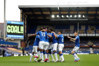 LIVERPOOL, ENGLAND - OCTOBER 17: Michael Keane of Everton celebrates with teammates after scoring his sides first goal during the Premier League match between Everton and Liverpool at Goodison Park on October 17, 2020 in Liverpool, England. Sporting stadiums around the UK remain under strict restrictions due to the Coronavirus Pandemic as Government social distancing laws prohibit fans inside venues resulting in games being played behind closed doors. (Photo by Catherine Ivill/Getty Images)