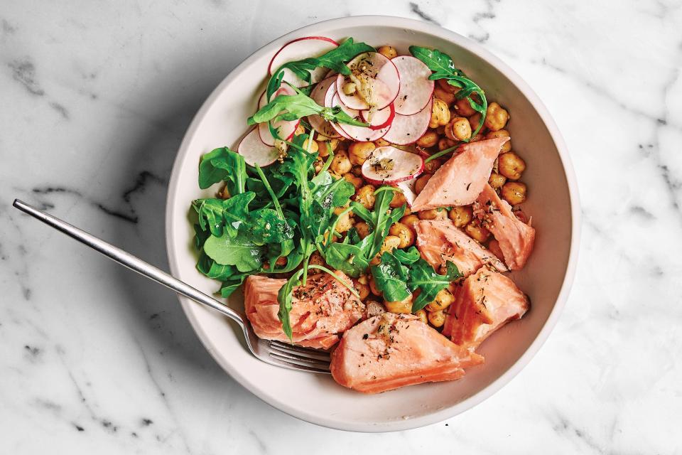Get your fish, chickpeas, and greens all in one bowl with this easy recipe. The salmon's cook time is around 15 minutes, so you can get dinner on the table quickly even if you got home from work late. <a href="https://www.epicurious.com/recipes/food/views/lemony-salmon-and-spiced-chickpeas?mbid=synd_yahoo_rss" rel="nofollow noopener" target="_blank" data-ylk="slk:See recipe.;elm:context_link;itc:0" class="link ">See recipe.</a>