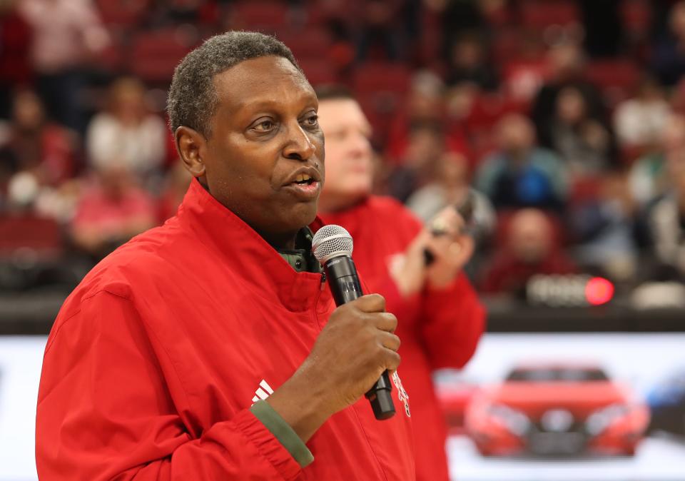Lancaster Gordon talks while Louisville basketball's 1983 Final Four team was honored at halftime of a Jan. 7, 2023, game against Wake Forest.