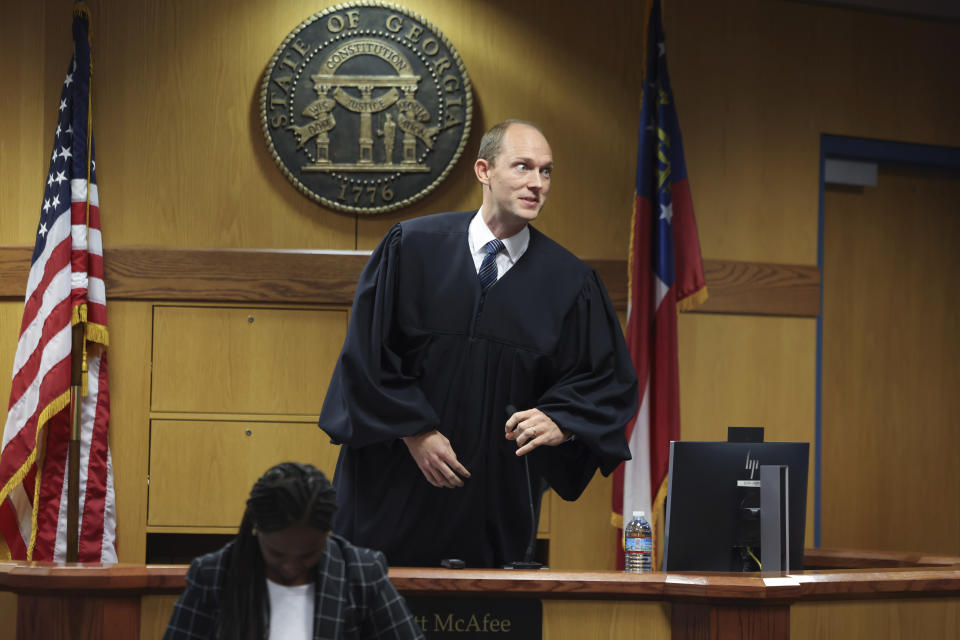 Fulton County Superior Judge Scott McAfee prepares to hear motions from attorneys representing Ken Chesebro and Sidney Powell in Atlanta on Wednesday, Sept. 6, 2023. (Jason Getz/Atlanta Journal-Constitution via AP, Pool)