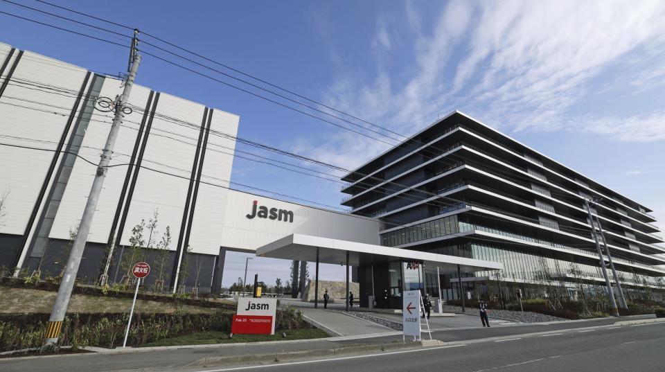 This photo shows a newly built plant to be run by Japan Advanced Semiconductor Manufacturing Company, Ltd. (JASM), a subsidiary of Taiwan Semiconductor Manufacturing Co. (TSMC), in Kikuyo town, a suburb of Kumamoto, southwestern Japan, Saturday, Feb. 24, 2024. TSMC opened Saturday in an official ceremony its first semiconductor plant in Japan as part of its ongoing global expansion. JASM is set to be up and running later this year (Kyodo News via AP)