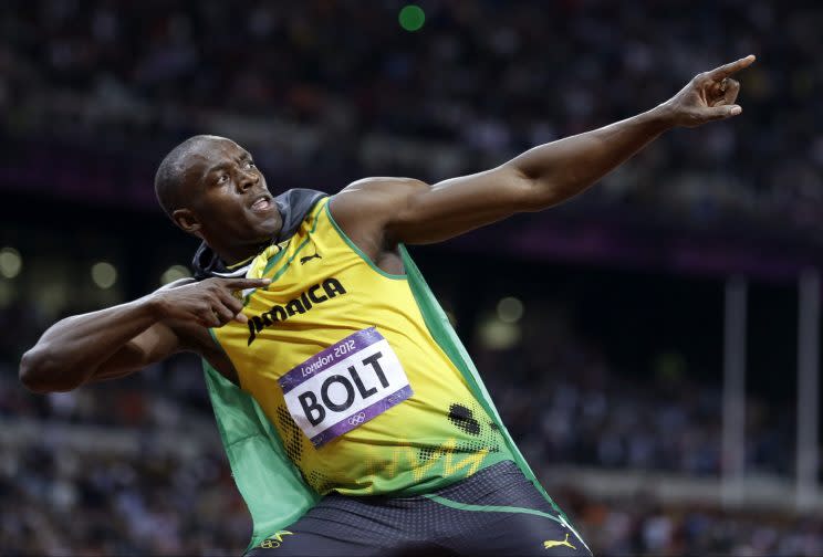Usain Bolt excels on the track and on Twitter. (Getty Images)