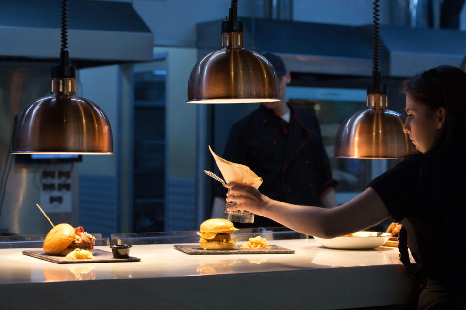 A member of staff takes a Beyond Burger food order inside a TGI Friday's Inc. restaurant in Moscow, Russia, on Sept. 27, 2019.<span class="copyright">Andrey Rudakov/Bloomberg—Getty Images</span>