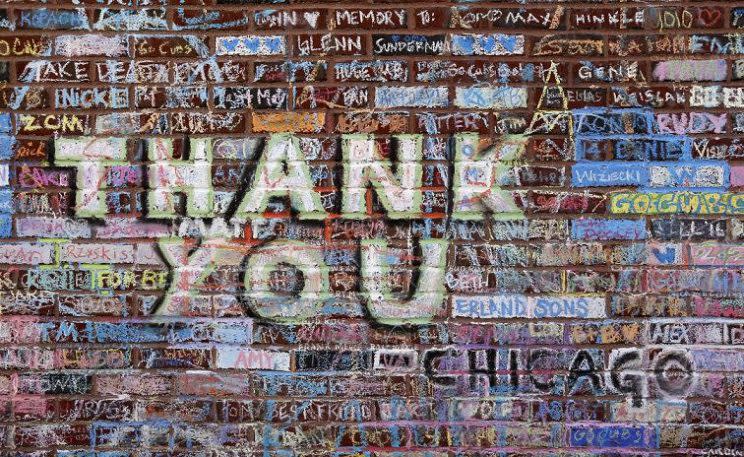 A look at the chalk-covered walls outside Wrigley Field before they were washed away. (AP)