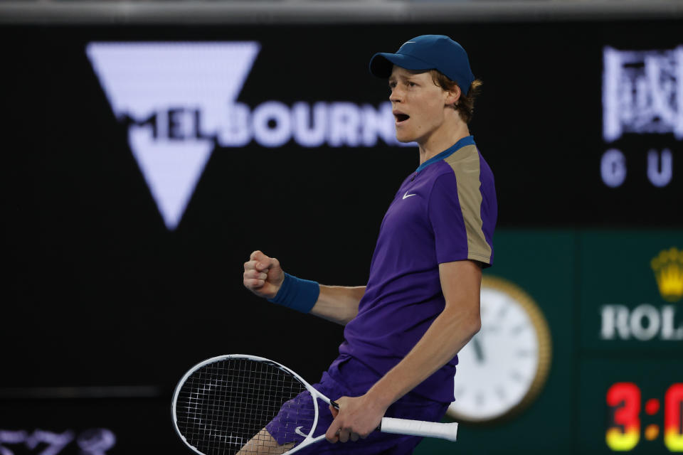 Italy's Jannik Sinner reacts after winning a point against Canada's Denis Shapovalov during the first round match at the Australian Open tennis championship in Melbourne, Australia, Monday, Feb. 8, 2021. (AP Photo/Rick Rycroft)