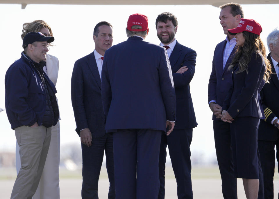 Republican presidential candidate former President Donald Trump, center, speaks with, from left to right, Rep. Jim Jordan, Bernie Moreno, Sen. J.D. Vance and South Dakota Gov. Kristi Noem at a campaign rally Saturday, March 16, 2024, in Vandalia, Ohio. (AP Photo/Jeff Dean)