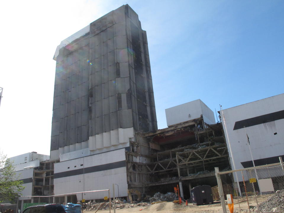 This Oct. 1, 2020 photo shows the partially demolished Trump Plaza casino in Atlantic City, N.J. On Dec. 16, 2020, the city announced it would auction off the right to push the button to dynamite the remainder of the casino next month as a means to raise money for a local youth charity. (AP Photo/Wayne Parry)