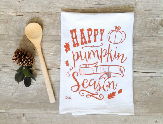 Get it <a href="https://www.etsy.com/listing/243896295/pumpkin-spice-tea-towel-autumn-kitchen" target="_blank"><strong>here</strong></a>, $11.