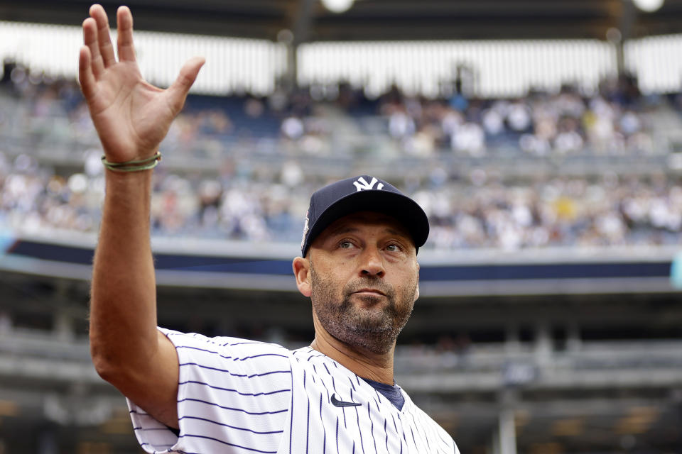 Former New York Yankees' Derek Jeter waves during Yankees Old-Timers' Day ceremony before a baseball game against the Milwaukee Brewers on Saturday, Sept. 9, 2023, in New York. (AP Photo/Adam Hunger)