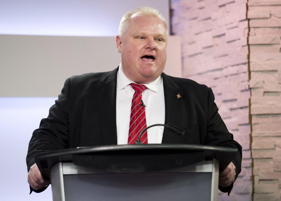 Rob Ford takes part in the first debate for the Toronto mayoral race in Toronto, Wednesday, March 26, 2014. (AP Photo/The Canadian Press, Nathan Denette)