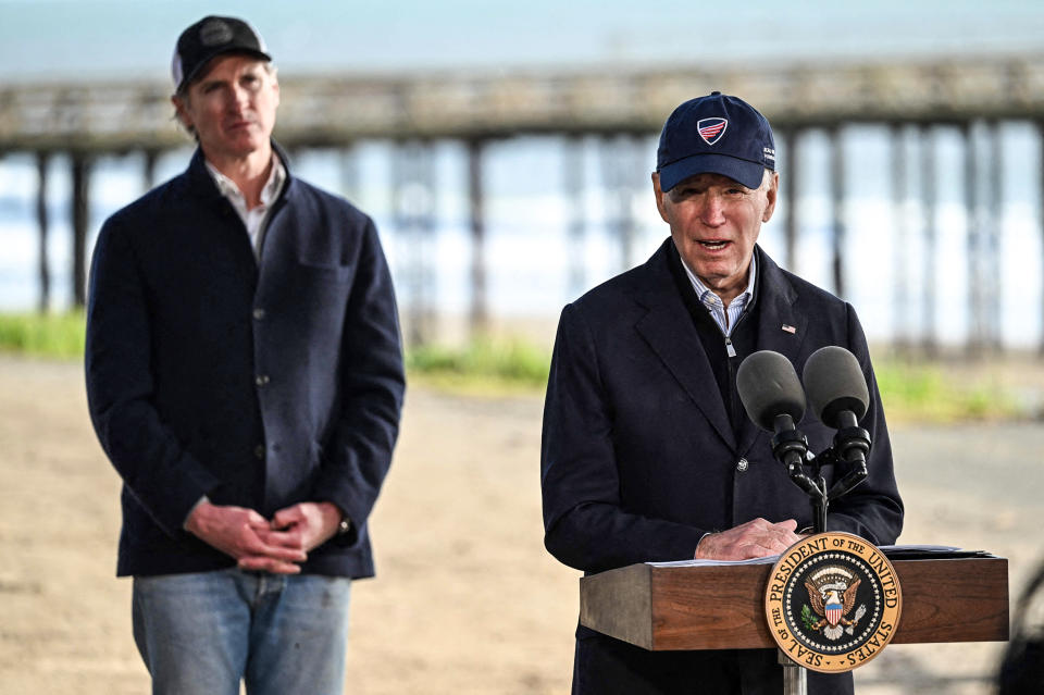 Image: President Joe Biden speaks as California Governor Gavin Newsom looks on after looking at storm damage, and speaking to those affected in Seacliff, Calif., on Jan. 19, 2023.  (Andrew Caballero-Reynolds / AFP - Getty Images)