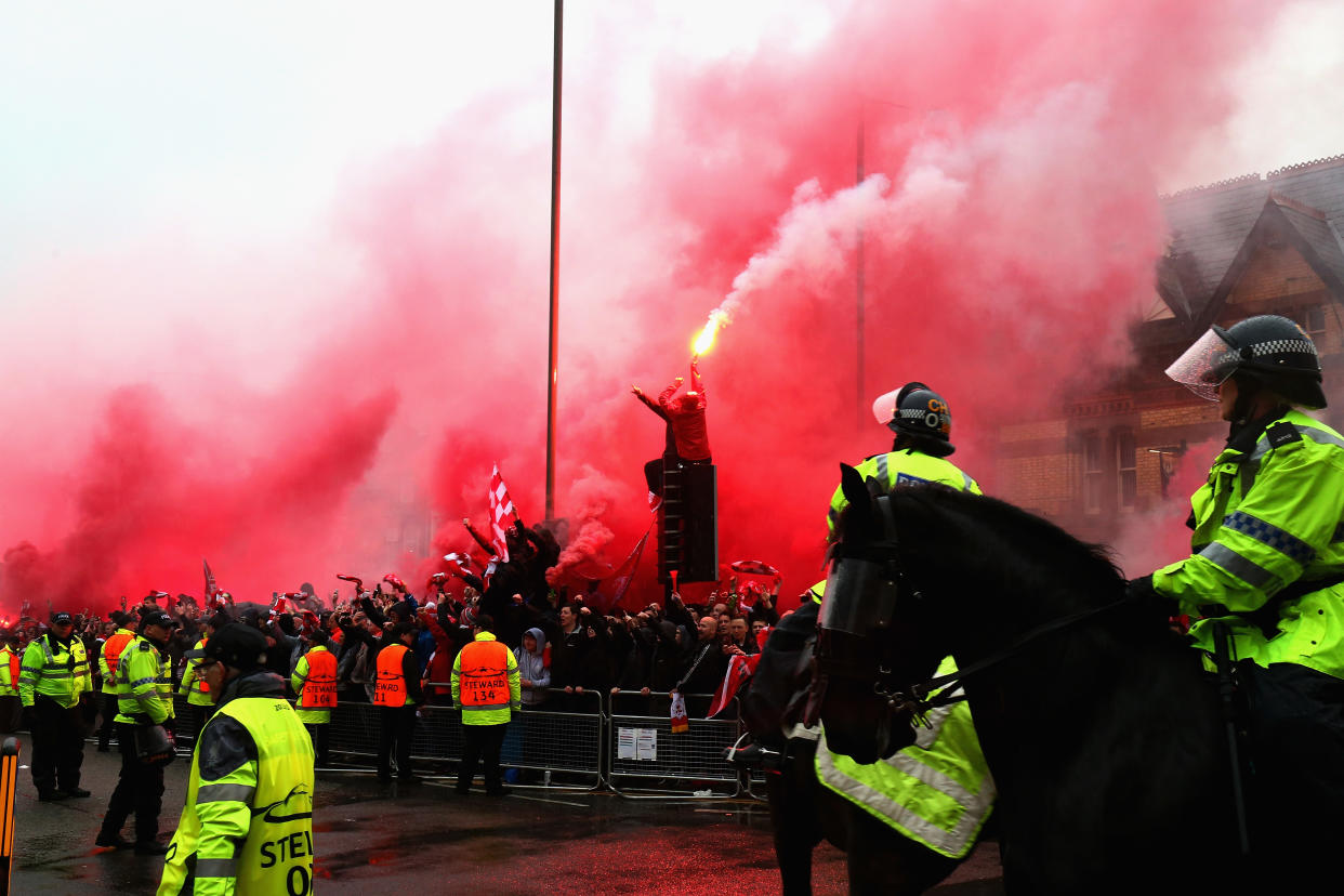 A chaotic scene enveloped Liverpool’s Anfield stadium before a Champions League match. (Getty Images)