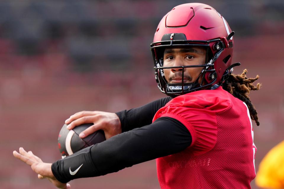 Cincinnati Bearcats quarterback Samaj Jones (5) throws during spring football practice. Jones is an early enrollee.