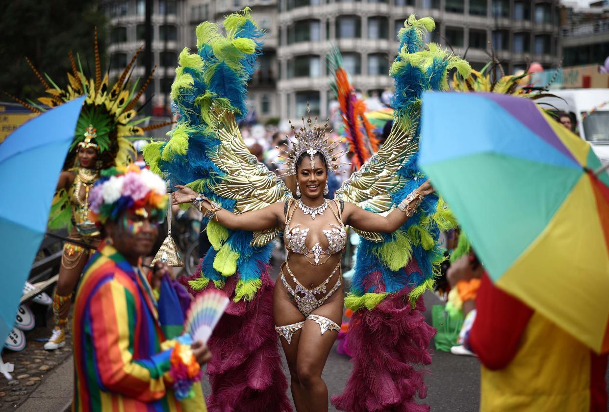 Members of the LGBT+ community take part in the annual Pride Parade in the streets of London (AFP via Getty Images)