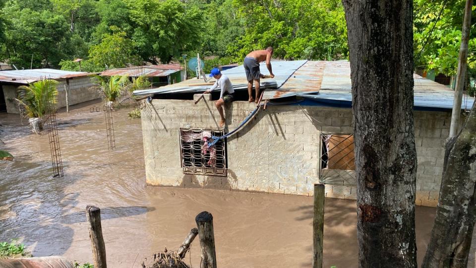 A river swelled on the road from Cumana to Cumanacoa, Sucre State, Venezuela (AFP via Getty Images)