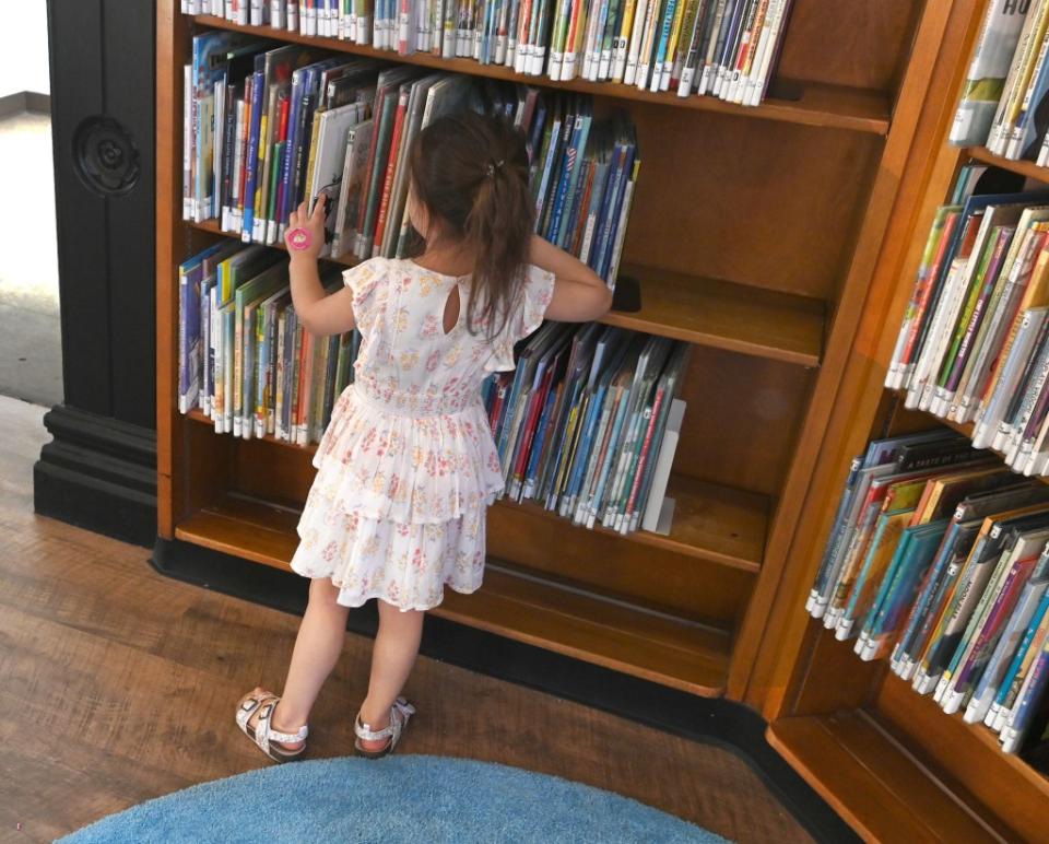 New Yorkers — including kids — could soon see most public-library branch hours slashed dramatically due to $58.3 million in proposed budget cuts by Mayor Adams. Helayne Seidman