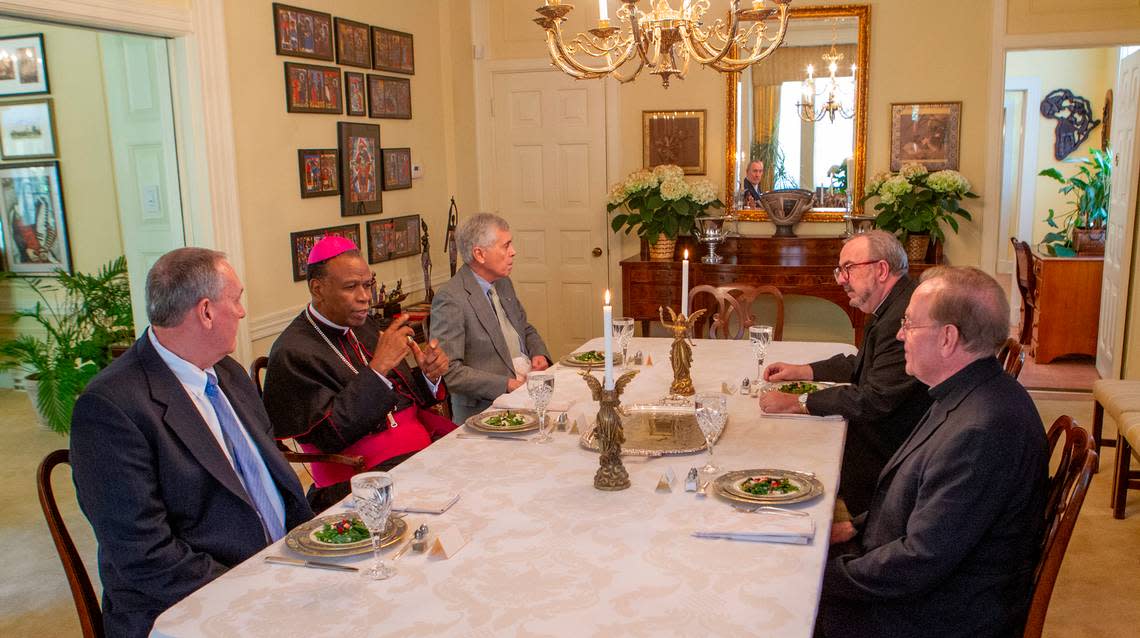 A 2015 photo shows Bishop Edward Braxton hosting a lunch in the first floor dining room in the bishop’s mansion during the time Braxton lived there.