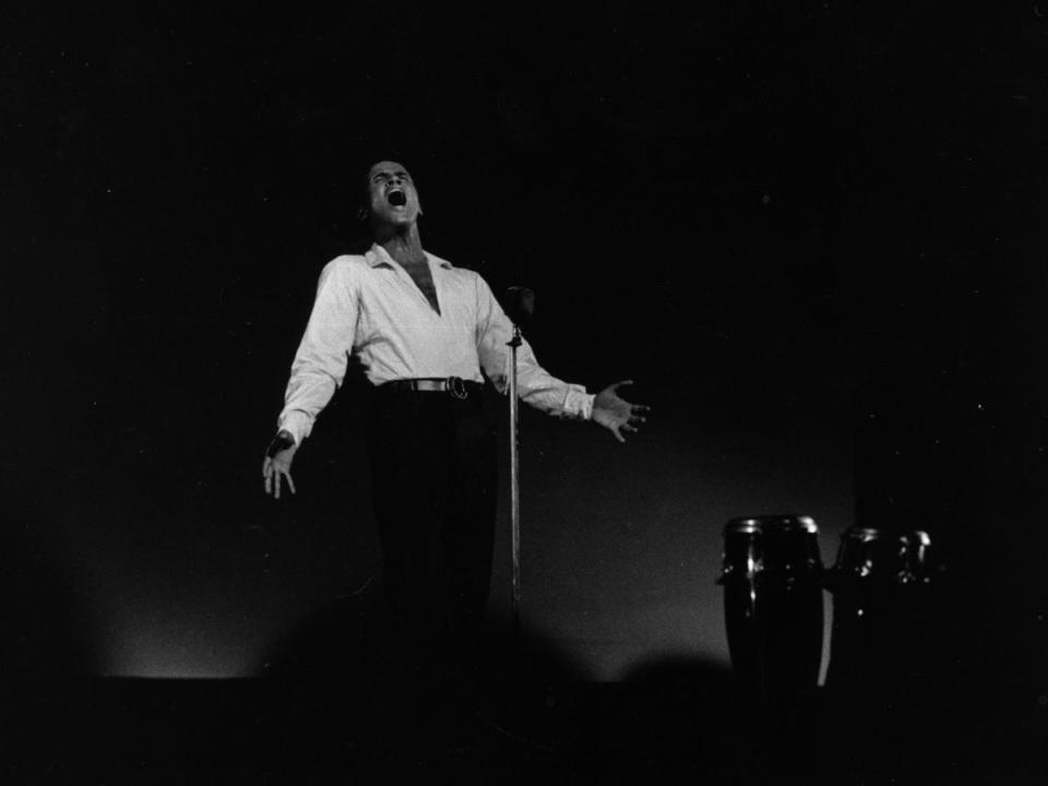 Belafonte in concert at the Kilburn National Ballroom in 1958 (Getty)