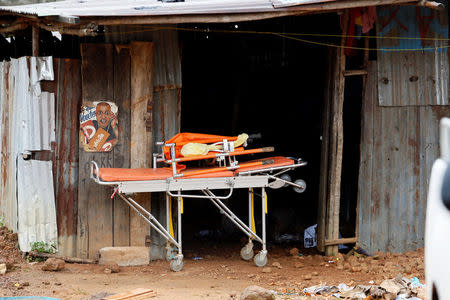 Two stretchers are placed under a shed in the mountain town of Regent, Sierra Leone August 16, 2017. REUTERS/Afolabi Sotunde