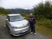 Heiko Hauschulz poses next to his electric car in a remote village in Hjelmeland, Norway September 7, 2017. Picture taken September 7, 2017. REUTERS/Alister Doyle