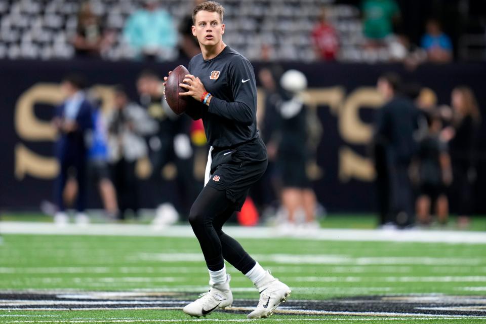 Cincinnati Bengals quarterback Joe Burrow (9) warms up before an NFL Week 6 game against the New Orleans Saints, Sunday, Oct. 16, 2022, at Mercedes-Benz Superdome in New Orleans.