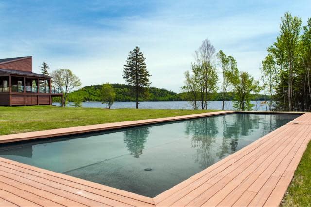 <p>The property has two pools. This modern number overlooking the lake. (Keller Williams Capital Realty) </p>