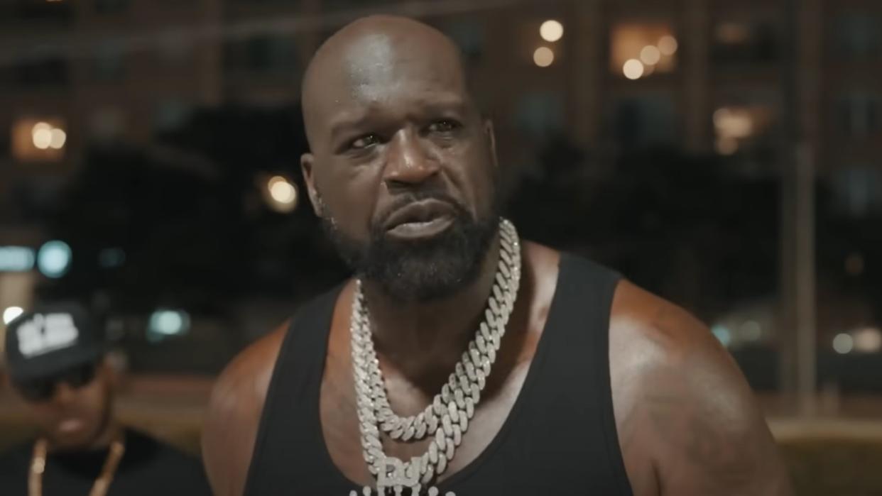  Shaquille O'Neal in music video for "Stop the Rain". 