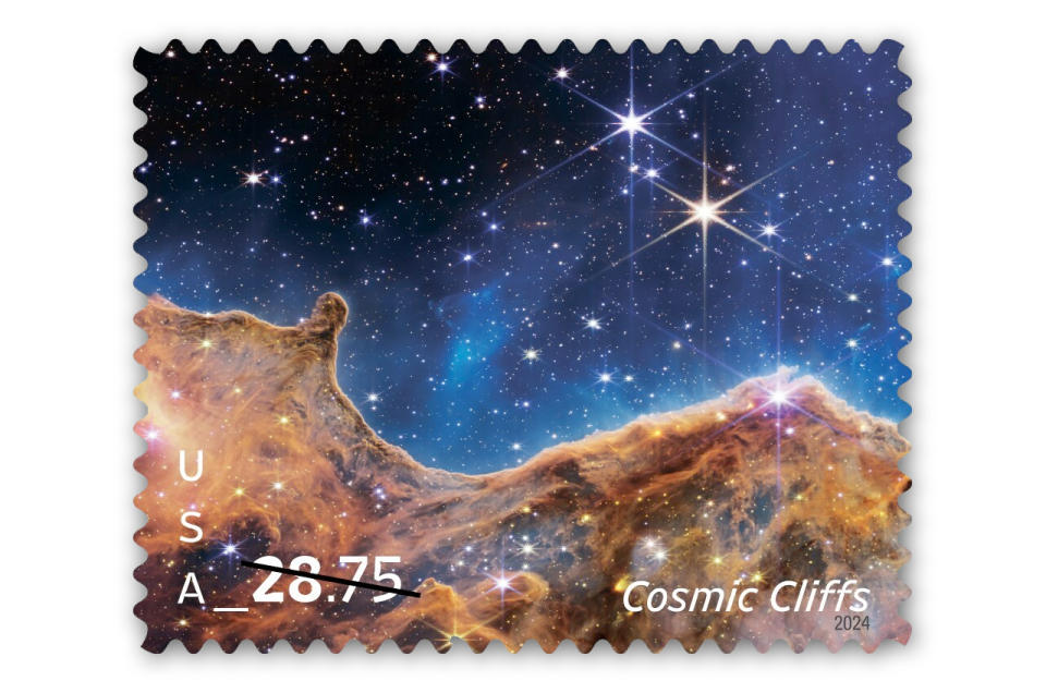 stamp showing an orange-brown nebula that looks like hills against a star-studded, blue-back background with 