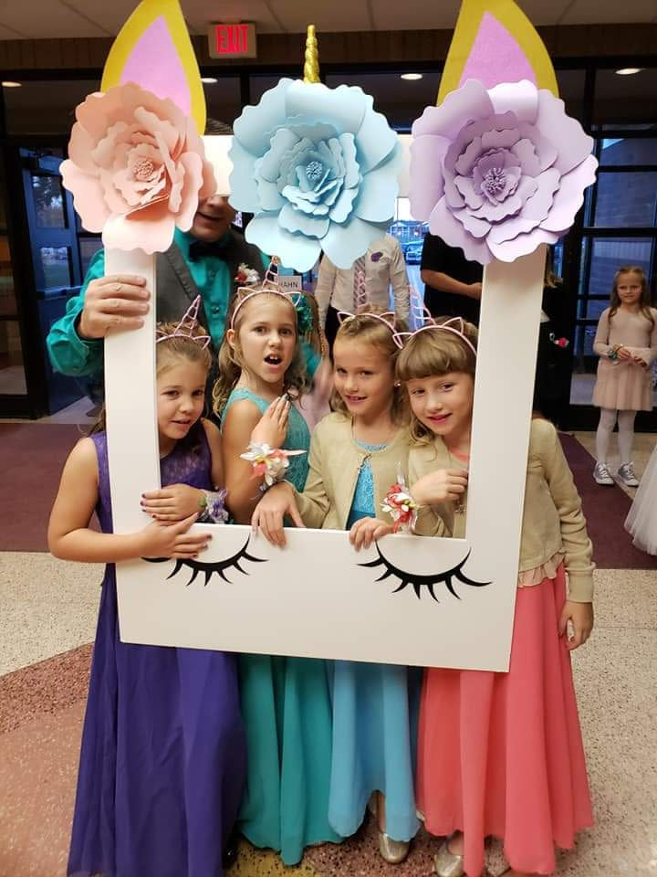 From left: Aliyah Culbert, Hailey Culbert, Avery Reece, and Alivia Reece hamming it up at the dance. (Photo: Courtesy of Steve Culbert)